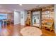 Elegant living space featuring a decorative mirror, hardwood floors, and comfortable seating at 902 Mikell Dr, Charleston, SC 29412