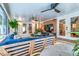 Covered patio with ceiling fans and view of backyard at 902 Mikell Dr, Charleston, SC 29412