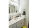 Bright bathroom with a vanity, a sink and sleek fixtures, perfect for morning routines at 9887 Midview Dr, Ladson, SC 29456
