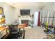 Inviting living room with fireplace and recreational space at 9887 Midview Dr, Ladson, SC 29456