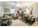 Cozy living room featuring comfortable seating and a decorated area for recreation and relaxation at 9887 Midview Dr, Ladson, SC 29456