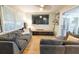 Cozy living room featuring a large window and comfortable seating at 9887 Midview Dr, Ladson, SC 29456