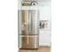 Modern stainless steel refrigerator with water dispenser complements the white cabinetry at 9887 Midview Dr, Ladson, SC 29456