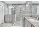 Bright bathroom featuring a glass enclosed shower and double sink vanity with granite countertops at 1011 Old Field Dr, Summerville, SC 29483