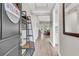 Bright, open foyer with wood floors, high ceilings, and views into the living area, creating an inviting entrance at 1011 Old Field Dr, Summerville, SC 29483