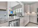 Spacious kitchen featuring granite countertops, stainless steel appliances, and ample cabinet space for storage at 1011 Old Field Dr, Summerville, SC 29483