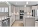Modern kitchen featuring granite countertops, stainless steel appliances, and custom cabinetry for a sleek design at 1011 Old Field Dr, Summerville, SC 29483