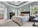 The main bedroom features lots of light and trey ceilings. It is tastefully decorated and has an adjoining bath at 1011 Old Field Dr, Summerville, SC 29483