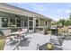 Outdoor patio with built-in grill, perfect for entertaining and enjoying the serene backyard at 1011 Old Field Dr, Summerville, SC 29483