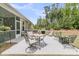 Outdoor patio with built-in grill, perfect for entertaining and enjoying the serene backyard at 1011 Old Field Dr, Summerville, SC 29483