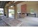 Covered recreation area with picnic tables, a brick fireplace, and views of the surrounding property at 1011 Old Field Dr, Summerville, SC 29483
