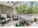 Relaxing screened porch with comfortable seating and peaceful views of the landscaped backyard at 1011 Old Field Dr, Summerville, SC 29483