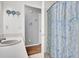Bathroom boasts tile flooring and a shower with modern fixtures at 1019 Tj Ln, Summerville, SC 29486