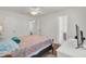 Bright bedroom features hardwood floors, queen bed, and ample closet space at 1019 Tj Ln, Summerville, SC 29486