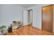 Bedroom with wood floors, a door, and a closet for storage at 1019 Tj Ln, Summerville, SC 29486