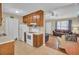 Cozy kitchen features tile floor, wooden cabinets, and white appliances at 1019 Tj Ln, Summerville, SC 29486