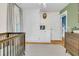 Bedroom with crib, built-in storage, hardwood floors, and plenty of room to grow at 1023 Shelley Rd, Charleston, SC 29407