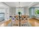 Elegant dining room featuring a chandelier, hardwood floors, and seating for eight at 1023 Shelley Rd, Charleston, SC 29407