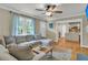 Comfortable living room with hardwood floors and view into the kitchen at 1023 Shelley Rd, Charleston, SC 29407