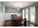 Cozy dining room with a wooden table and decorative lighting at 103 Winston Way, Goose Creek, SC 29445