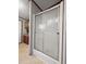 Bathroom featuring a glass door walk-in shower with bright white walls at 107 Bessie Ln, Bonneau, SC 29431