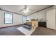 Comfortable bedroom with carpet flooring, windows and furniture at 107 Bessie Ln, Bonneau, SC 29431