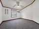 Bedroom featuring a ceiling fan, one window for natural light, and neutral colored carpet at 107 Bessie Ln, Bonneau, SC 29431