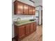 This built-in hutch offers great storage near the kitchen and a view into the bedroom at 107 Bessie Ln, Bonneau, SC 29431