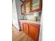 Charming built-in hutch providing ample storage space with glass cabinet and countertop at 107 Bessie Ln, Bonneau, SC 29431