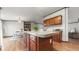 Spacious kitchen island featuring a flat countertop and rich wood cabinetry and base at 107 Bessie Ln, Bonneau, SC 29431