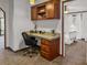 Home office with built-in desk and storage, located in bedroom at 107 Bessie Ln, Bonneau, SC 29431