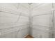 Full view of walk-in closet with white wire shelving at 107 Bessie Ln, Bonneau, SC 29431