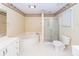 Bright bathroom featuring a shower, soaking tub, and tile flooring at 1100 Cass Dr, Moncks Corner, SC 29461