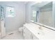 Bathroom featuring tub, shower, toilet, vanity, sink, and mirror at 1100 Cass Dr, Moncks Corner, SC 29461