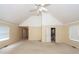 Large bedroom boasts neutral walls, ceiling fan, and entrance to bathroom at 1100 Cass Dr, Moncks Corner, SC 29461