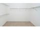 Walk-in closet equipped with metal racks and carpeted flooring at 1100 Cass Dr, Moncks Corner, SC 29461