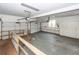 Spacious two car garage with additional built-in shelving at 1100 Cass Dr, Moncks Corner, SC 29461