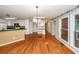 Expansive kitchen area with hardwood floors, ample cabinetry, modern appliances, and natural light at 1100 Cass Dr, Moncks Corner, SC 29461