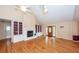 Spacious living room showcasing a fireplace, built-in bookshelves, and natural light, perfect for relaxation at 1100 Cass Dr, Moncks Corner, SC 29461