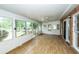 Inviting sunroom with lots of natural light and views of the lush backyard at 1100 Cass Dr, Moncks Corner, SC 29461