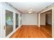 Cozy sunroom with hardwood floors, large windows, and a ceiling fan for year-round comfort at 1100 Cass Dr, Moncks Corner, SC 29461