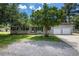 Charming brick home with a well-maintained yard and a two-car garage on a sunny day at 115 Myers Rd, Summerville, SC 29486