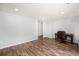 A bright office space with wood floors, shiplap accent wall, and recessed lighting at 115 Myers Rd, Summerville, SC 29486