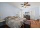 Bright bedroom featuring wood floors, ample natural light, and a dresser at 115 S Ainsdale Dr, Charleston, SC 29414