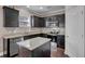 Kitchen features an island, stainless steel appliances and granite countertops at 118 Beacon Falls Ct, Summerville, SC 29486