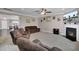 Cozy living room featuring comfortable seating, a fireplace, and an open layout at 118 Beacon Falls Ct, Summerville, SC 29486