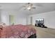 Bright main bedroom with vaulted ceiling, television and ensuite bathroom at 118 Beacon Falls Ct, Summerville, SC 29486
