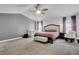 Generous main bedroom with vaulted ceiling, a crib, and large windows with plush carpeting at 118 Beacon Falls Ct, Summerville, SC 29486