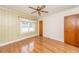 Bedroom with hardwood floors, neutral decor, a ceiling fan and one window allowing for natural light at 1226 Forestwood Dr, Charleston, SC 29407