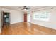 Bright living room features hardwood floors, large window, and neutral walls at 1226 Forestwood Dr, Charleston, SC 29407